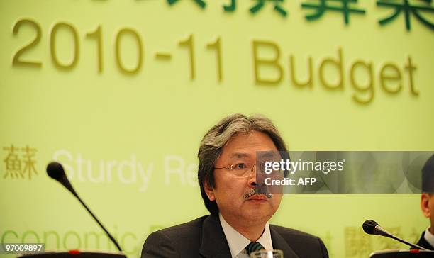 Hong Kong Financial Secretary John Tsang listens to questions during a media briefing in Hong Kong on February 24, 2010. Hong Kong said that it will...