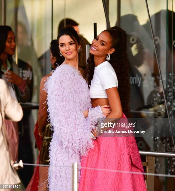 Kendall Jenner and Joan Smalls arrive to the 2018 CFDA Fashion Awards at Brooklyn Museum on June 4, 2018 in New York City.