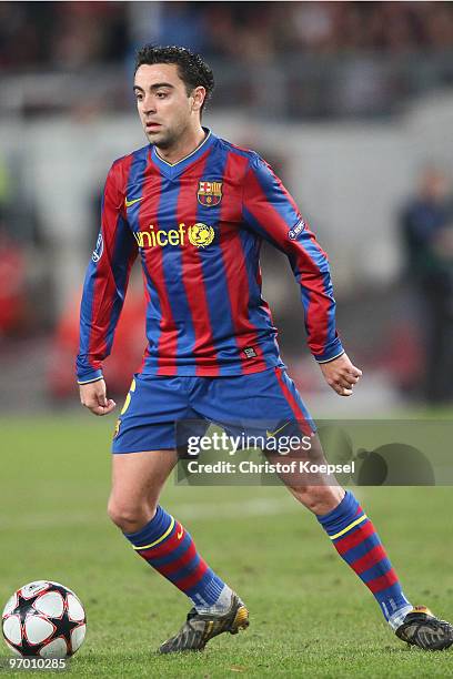 Xavi Hérnandez of Barcelona runs with the ball during the UEFA Champions League round of sixteen, first leg match between VfB Stuttgart and FC...