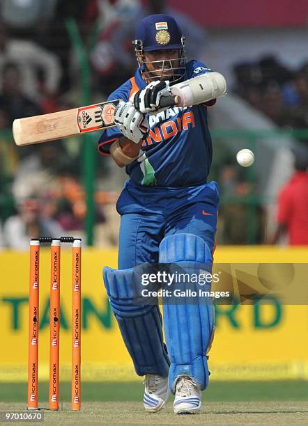 Virender Sehwag of India pulls a delivery to mid-on during the 2nd ODI between India and South Africa from Captain Roop Singh Stadium on February 24,...