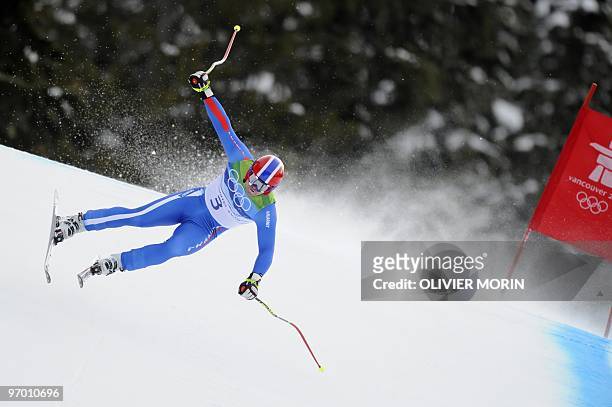 France's David Poisson takes a curve during the Men's Vancouver 2010 Winter Olympics Downhill event at Whistler Creek side Alpine skiing venue on...