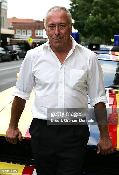 Actor Steve Bisley, who played the character Jim Goose in Mad Max, poses with the original Interceptor car from the movie as he arrives for the...