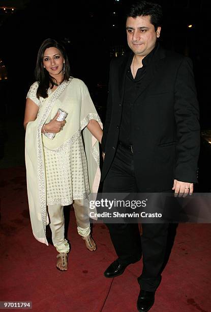 Bollywood actress Sonali Bendre and her husband, filmmaker Goldie Behl arrives to attend the wedding reception for Rashi Agarwal and Hemant Bhanadari...