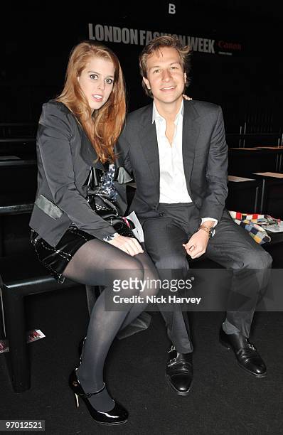 Princess Beatrice and Dave Clark pose on the front row at the Issa London show for London Fashion Week Autumn/Winter 2010 at Somerset House on...