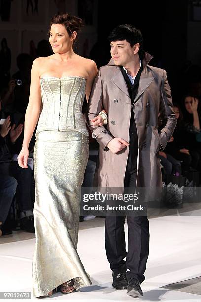 LuAnn de Lesseps and Malan Breton walk during Malan Breton Fall 2010 at Stage 37 on February 17, 2010 in New York City.