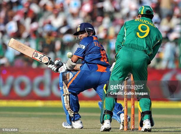Sachin Tendulkar of India sweeps a delivery during the 2nd ODI between India and South Africa at Captain Roop Singh Stadium on February 24, 2010 in...