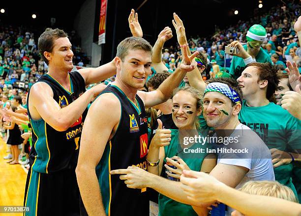 Jeff Dowdell and Keegan Tudehope acknowledge the crowd after winning game two of the NBL semi final series between the Townsville Crocodiles and the...