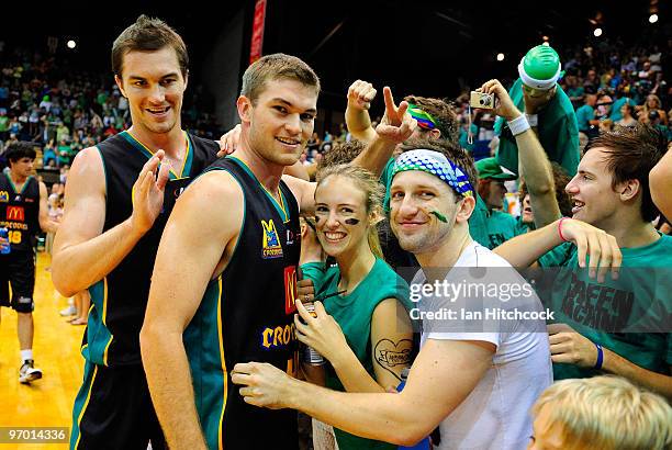 Jeff Dowdell and Keegan Tudehope acknowledge the crowd after winning game two of the NBL semi final series between the Townsville Crocodiles and the...