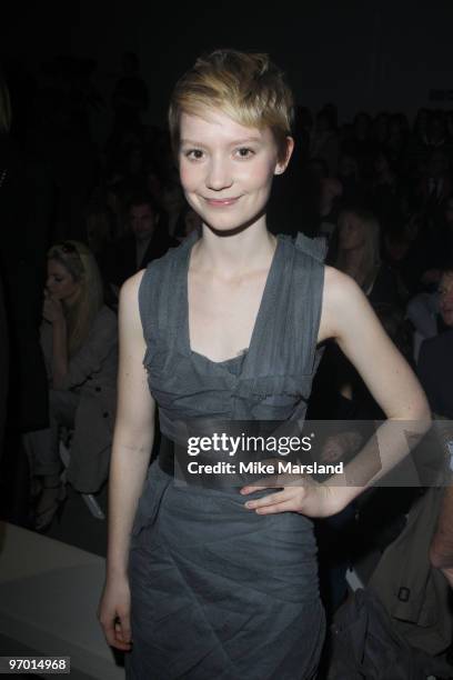 Mia Wasikowska poses on the front row at the Burberry Prorsum show for London Fashion Week Autumn/Winter 2010 at on February 23, 2010 in London,...