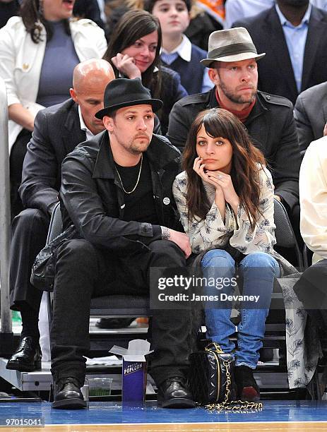 Joel Madden and Nicole Richie attend the Chicago Bulls vs New York Knicks game at Madison Square Garden on February 17, 2010 in New York City.