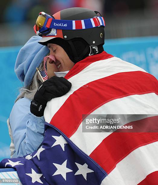 Seth Wescott of the US embraces his mother Margaret after winning the Men's Snowboard SBX final at Cypress Mountain during the Vancouver Winter...