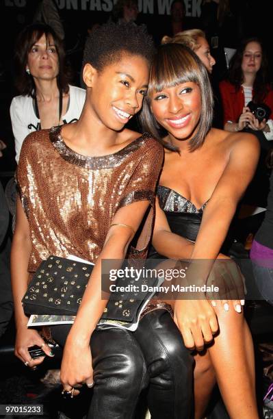 Tolula Adeyemi and Alexandra Burke pose on the front row at the Issa London show for London Fashion Week Autumn/Winter 2010 at Somerset House on...