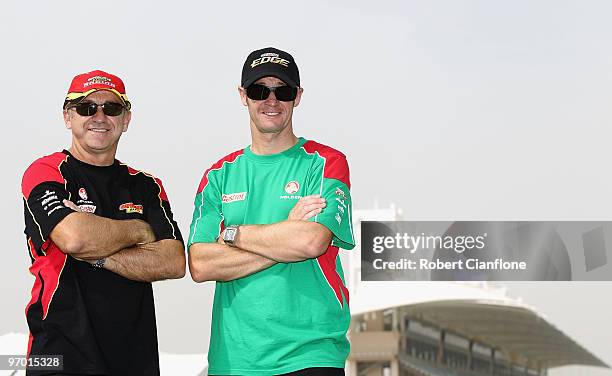 Russell Ingall driver of the Supercheap Auto Racing Holden and Greg Murphy driver of the Castrol Edge Racing Holden pose for a portrait as they walk...