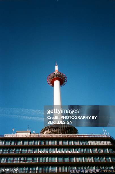 low angle view of kyoto tower against sky - kyoto tower stock pictures, royalty-free photos & images