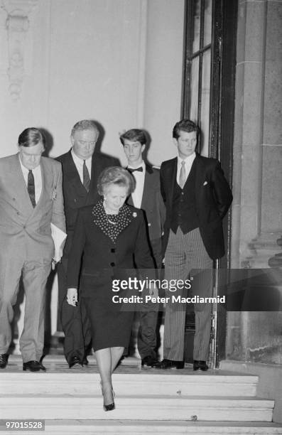 British Prime Minister Margaret Thatcher on the steps of the British Embassy in Paris, 20th November 1990. On the left is the Prime Minister's Chief...