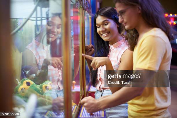 i want that one - claw machine stock pictures, royalty-free photos & images