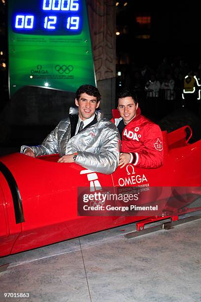 Olympic Gold Medalists Michael Phelps and Alexandre Bilodeau attend the OMEGA Cocktail Celebration at the Fairmont Hotel on February 18, 2010 in...