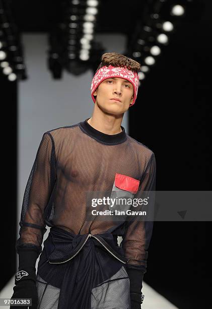 Model walks down the catwalk during the Christopher Shannon show as part of London Fashion Week Autumn/Winter 2010 at the BFC Show space at Somerset...