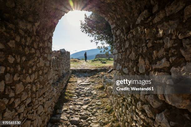 greece, peloponnese, arcadia, paralia astros, entrance to venetian castle - arcadia greece stock pictures, royalty-free photos & images