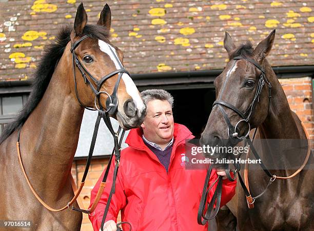 Trainer Paul Nicholls with his Cheltenham Gold Cup winning horses Kauto Star and Denman during an open day at his Manor farm Stables on February 24,...