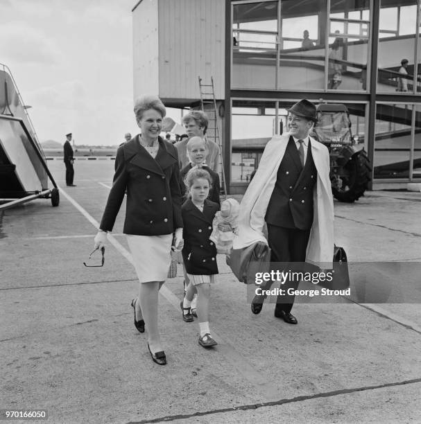 English actor, filmmaker, entrepreneur, and politician Richard Attenborough with his wife, English actress Sheila Sim and their children Michael,...