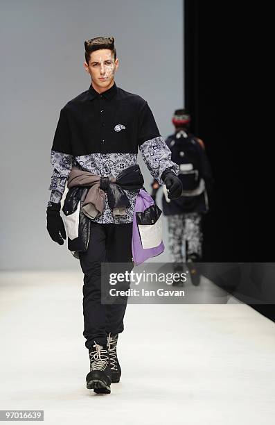 Model walks down the catwalk during the Christopher Shannon show as part of London Fashion Week Autumn/Winter 2010 at the BFC Show space at Somerset...