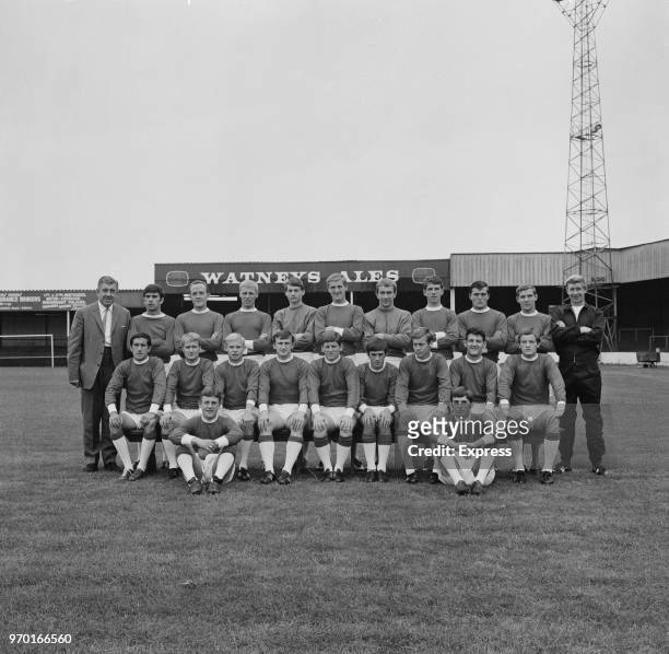 Lincoln City FC, group portrait, UK, 8th August 1967; the team are manager Ron Gray, trainer Bert Loxley, George Peden, Jim Grummett, Clive Ford,...