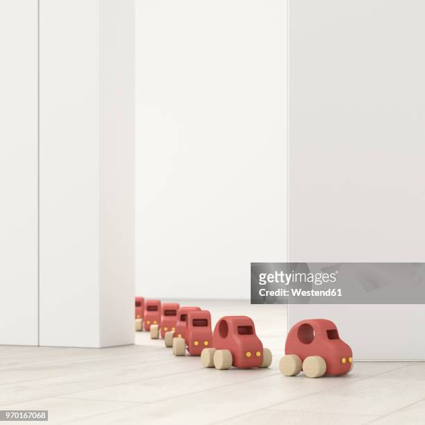 model cars in a row in an empty room, 3d rendering - spielzeugauto stock-grafiken, -clipart, -cartoons und -symbole