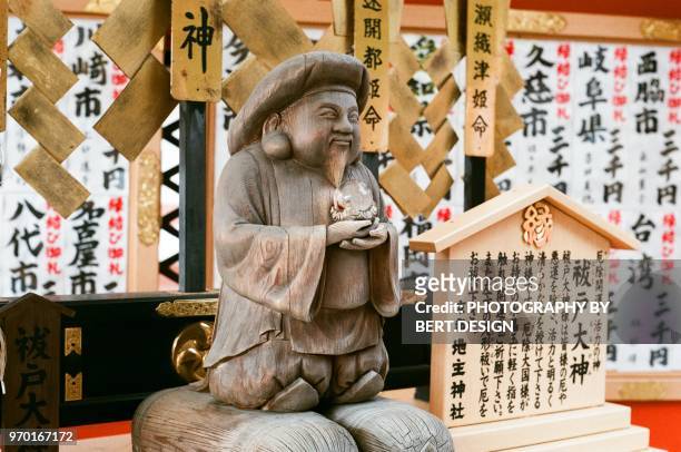 daikoku god of good fortune at kiyomizu-dera temple in kyoto, japan - shichi fukujin stockfoto's en -beelden