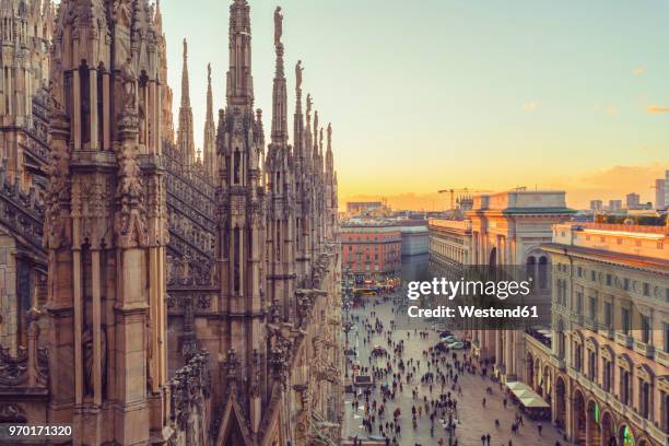 italy, lombardy, milan, milan cathedral at sunset - milan photos et images de collection