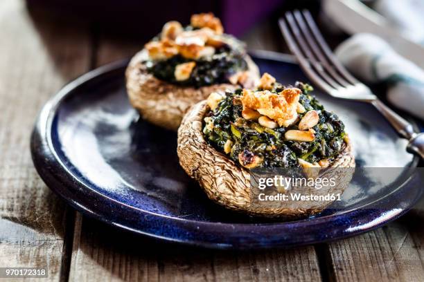 filled champignons with spinach and feta, vegetarian, low carb - portobello mushroom stock pictures, royalty-free photos & images