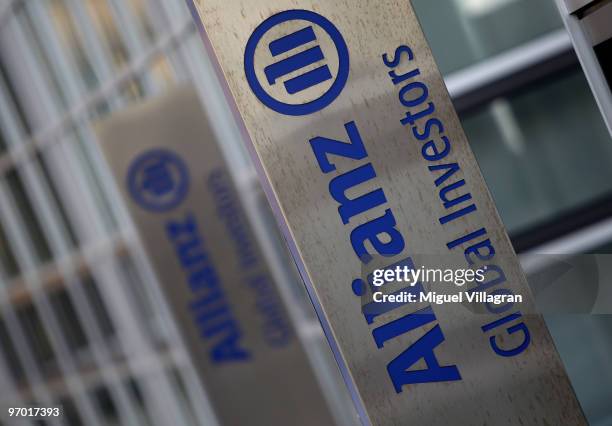 The logo of Allianz Global Investors is pictured next to a company's office building on February 24, 2010 in Munich, Germany. Allianz is to publish...