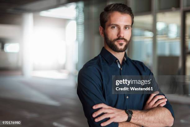 portrait of serious young businessman - 権力 ス��トックフォトと画像