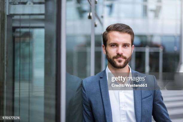 portrait of confident young businessman - suit stock-fotos und bilder