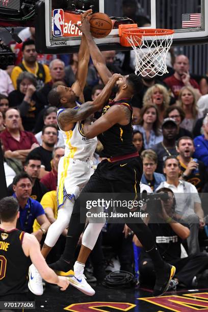 Andre Iguodala of the Golden State Warriors drives to the basket against Tristan Thompson of the Cleveland Cavaliers in the first half during Game...