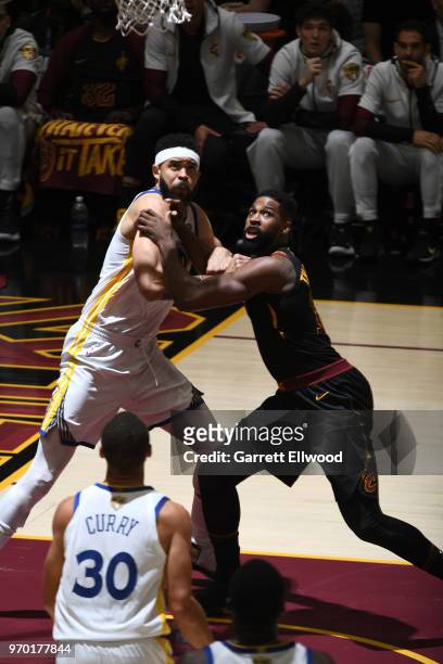 Tristan Thompson of the Cleveland Cavaliers fights for position against JaVale McGee of the Golden State Warriors during Game Four of the 2018 NBA...