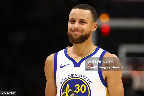 Stephen Curry of the Golden State Warriors reacts in the second half against the Cleveland Cavaliers during Game Four of the 2018 NBA Finals at...