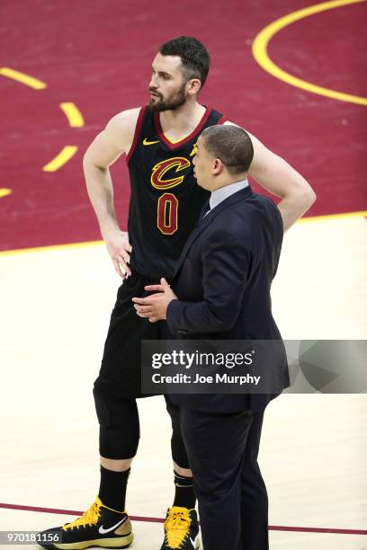 Kevin Love speaks to Head Coach Tyronn Lue of the Cleveland Cavaliers during the game in Game Four of the 2018 NBA Finals on June 8, 2018 at Quicken...