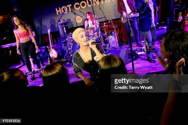 Maggie Rose performs on stage at the Spotify's Hot Country Presents Maggie Rose, Jackie Lee, Craig Campbell and moreat Ole Red During CMA Fest at Ole...