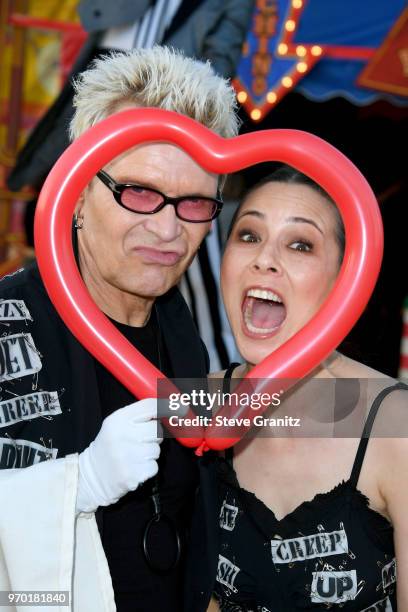 Billy Idol and China Chow attend the Moschino Spring/Summer 19 Menswear And Women's Resort Collection at Los Angeles Equestrian Center on June 8,...