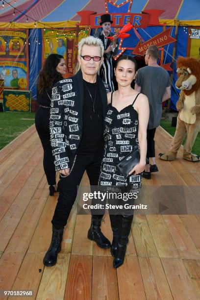 Billy Idol and China Chow attend the Moschino Spring/Summer 19 Menswear And Women's Resort Collection at Los Angeles Equestrian Center on June 8,...