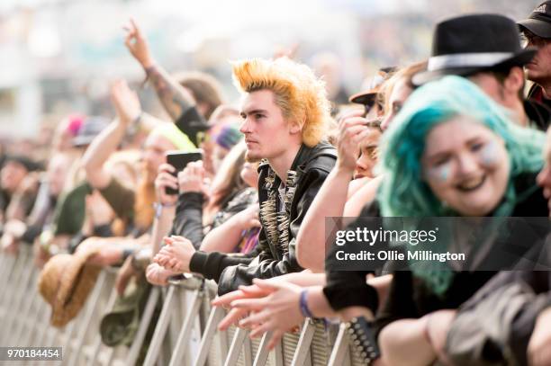 The crowd watch on as Jonathan Davis performs onstage at Download Festival 2018 at Donington Park on June 8, 2018 in Donington, England.