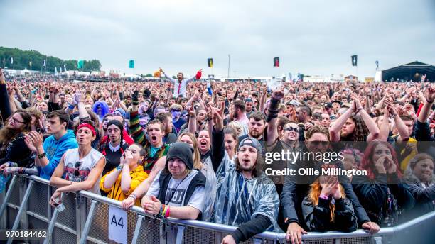 The crowd watch on as Andrew W K performs onstage at Download Festival 2018 at Donington Park on June 8, 2018 in Donington, England.