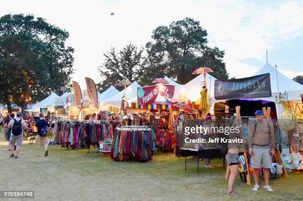 Festivalgoers seen in the Bonnaroo Market during day 2 of the 2018 Bonnaroo Arts And Music Festival on June 8, 2018 in Manchester, Tennessee.