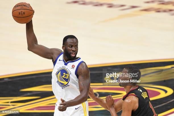 Draymond Green of the Golden State Warriors defended by Rodney Hood of the Cleveland Cavaliers during Game Four of the 2018 NBA Finals at Quicken...