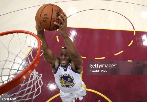 Andre Iguodala of the Golden State Warriors dunks in the fourth quarter against the Cleveland Cavaliers during Game Four of the 2018 NBA Finals at...