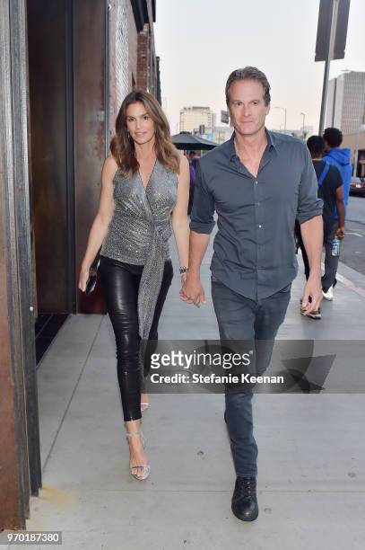Cindy Crawford and Rande Gerber arrive at the Casamigos House of Friends Dinner on June 8, 2018 in Hollywood, California.