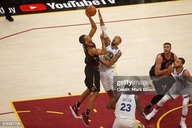 David West of the Golden State Warriors goes up to block a shot against Rodney Hood of the Cleveland Cavaliers in Game Four of the 2018 NBA Finals on...