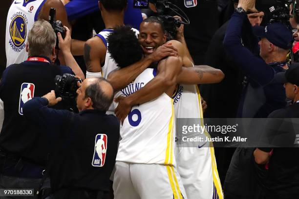 Nick Young and Andre Iguodala of the Golden State Warriors of the Golden State Warriors celebrates after defeating the Cleveland Cavaliers during...