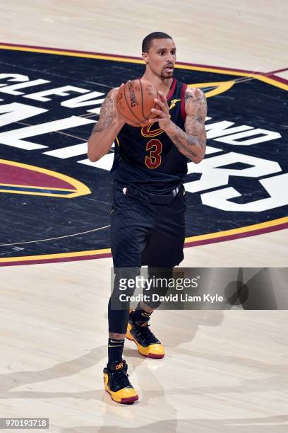 George Hill of the Cleveland Cavaliers looks to pass the ball during the game against the Golden State Warriors in Game Four of the 2018 NBA Finals...
